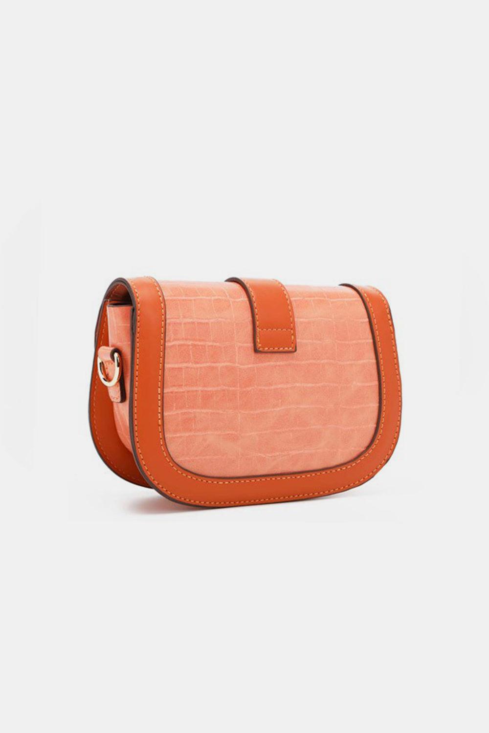 - Crossbody bags- Croc-embossed bags
