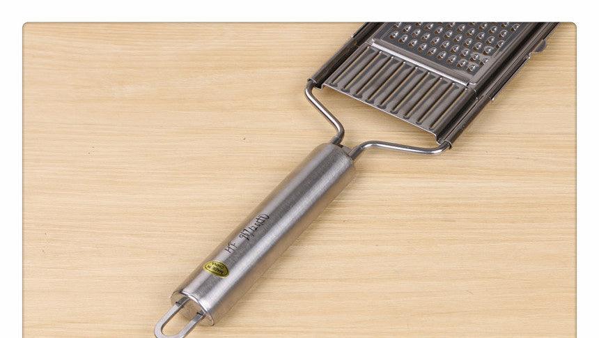 stainless steel grater, slicer, and peeler