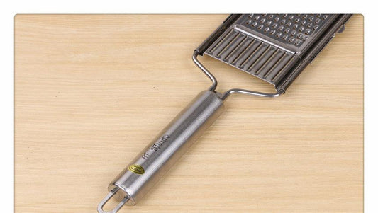 stainless steel grater, slicer, and peeler